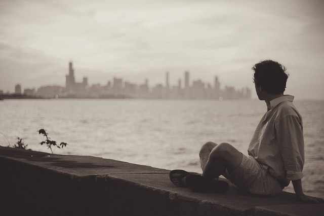 lonely-married-man-sitting-on-beach