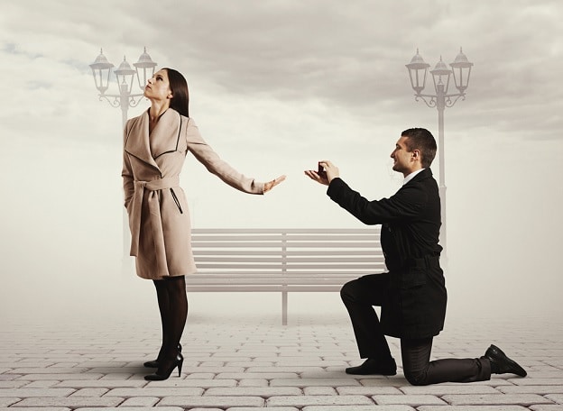 woman-rejecting-a-man-on-his-knee-with-a-ring